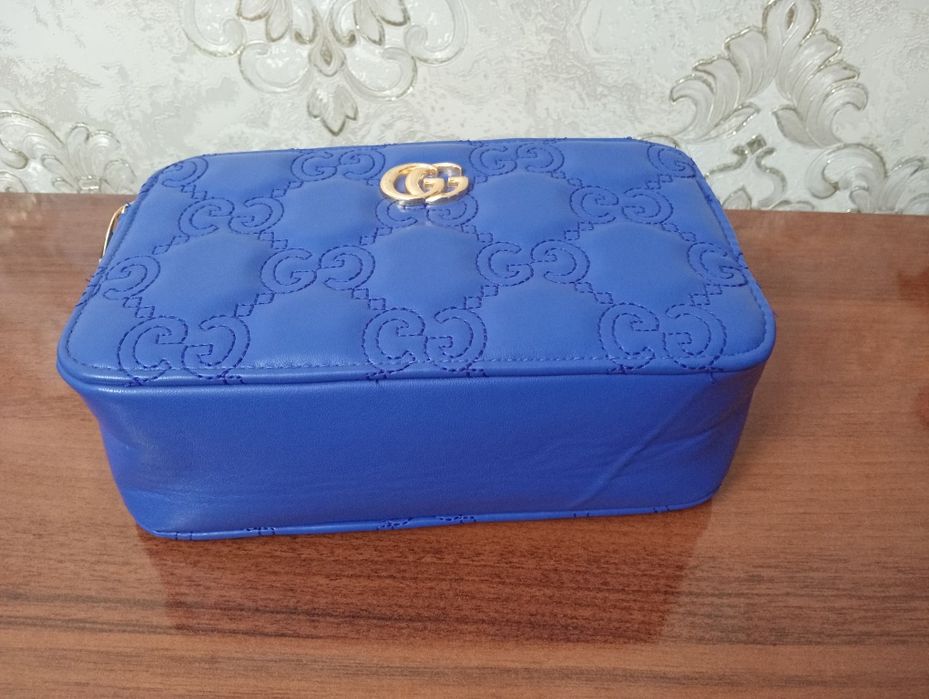 Клатч "Burberry", "Gucci".