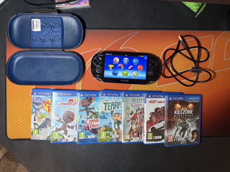 Ps Vita 1104 OLED 16GB, 7 игри, калъф, зарядно и адаптер за карта памет