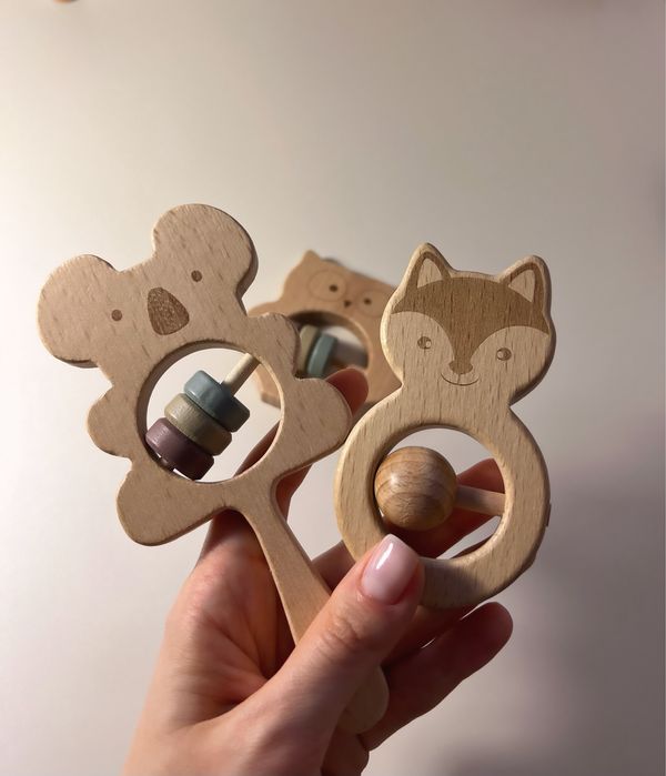 Деревянная развивающая игрушка погремушка