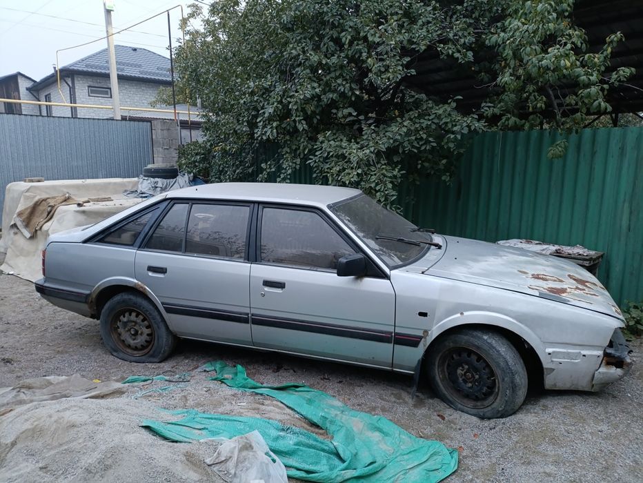 Продам Мазду 626 на запчасти