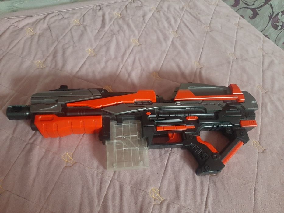 Игрушка автомат с пульками