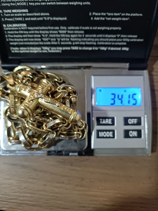 Златен ланец с кръст