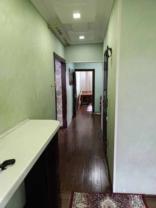 Юнусабад -19 2 х комн.передел.в трёх с обстановкой.