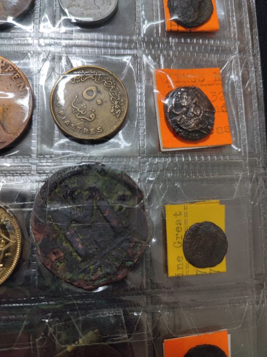 Moneda bizantină CON
Follis. 32-30 mm. 16,42 grame.Iustin I, 518-527.