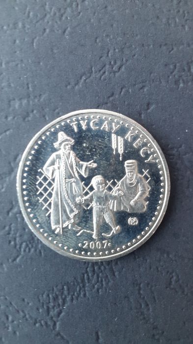 Монета "Тұсау кесу"