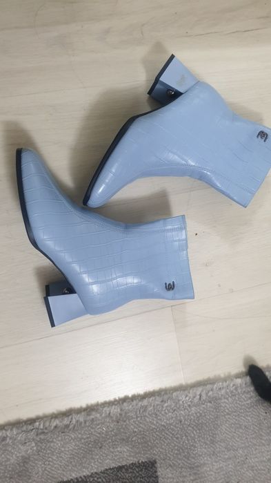 Продам Сапоги теплые.