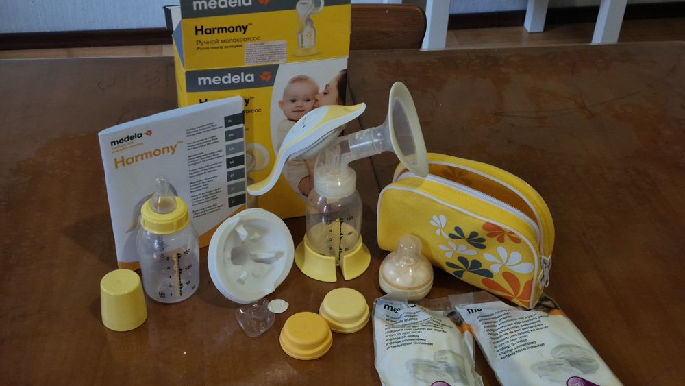 Молокоотсос Medela ручной и смартсоска Кальма