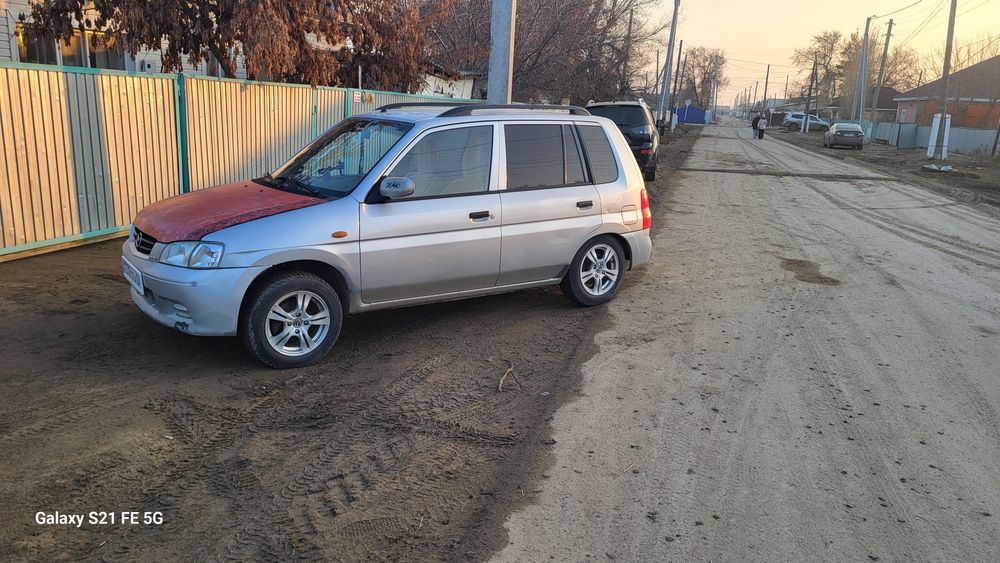 Мазда демио 2002год