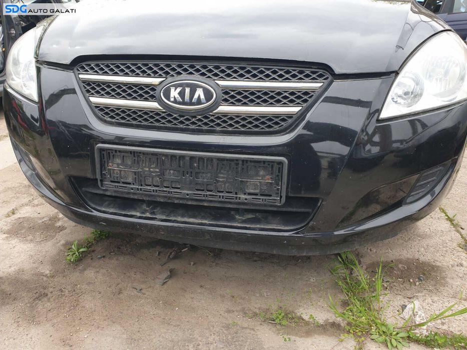 Bara Spoiler Fata Completa cu Grile Fara Grila cu Emblema cu Imperfectiuni Kia Ceed 2007 - 2010 Culoare 1K Black Pearl [Z0087]