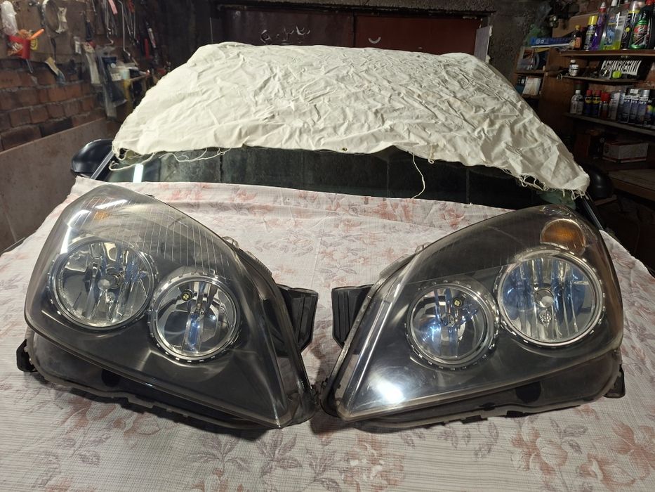 Opel astra h фарове  КОМПЛЕКТ GM Hella