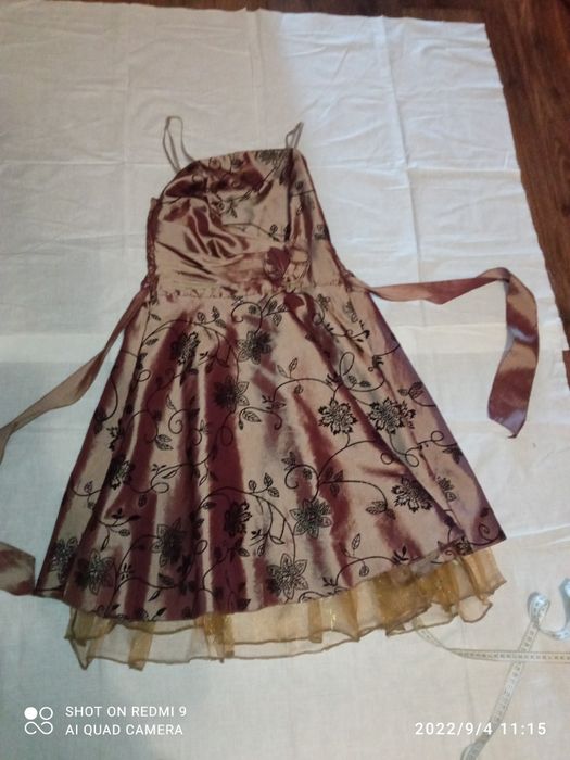 Женская одежда платья