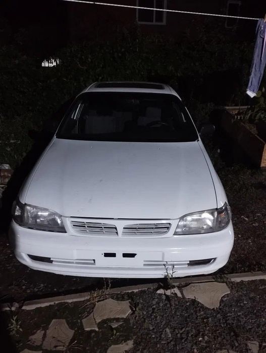 Тойота карина е