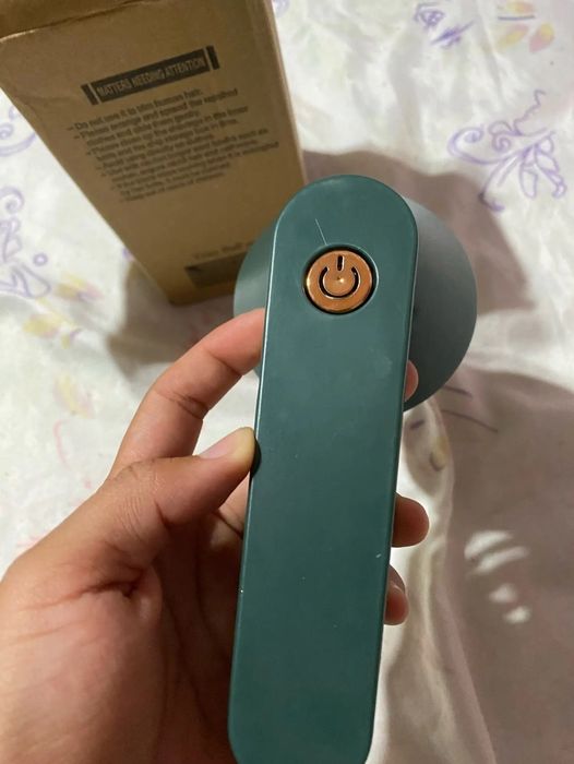 Електрически тример за дрехи