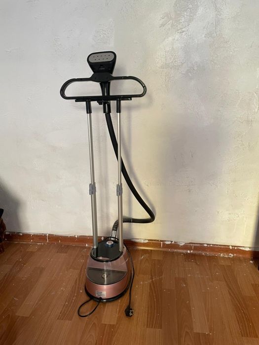 Отпариватель паровой утюг.