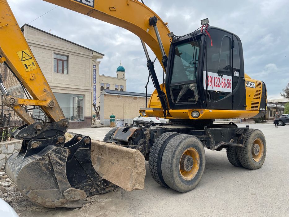 Экскаватор хизмати