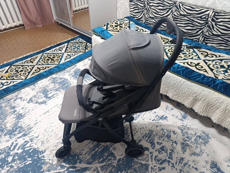 Продам прогулочную коляску TOMIX Corsa