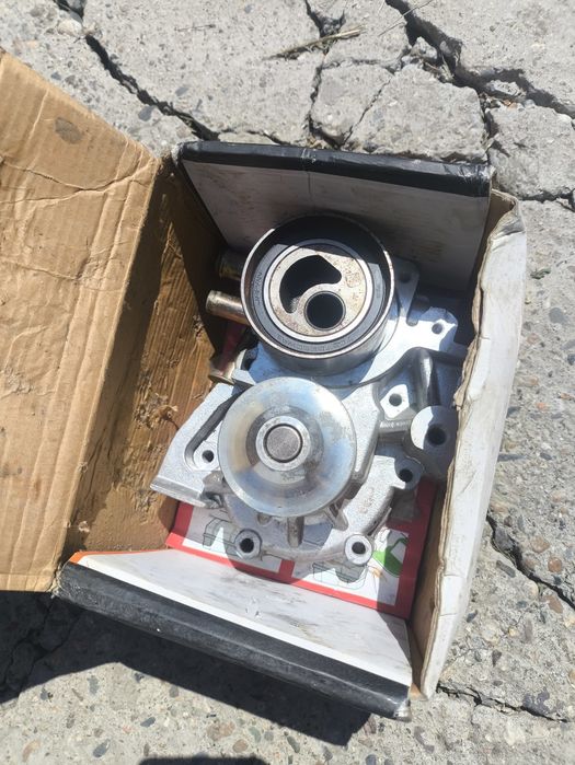 Продам помпу и ролик Subaru