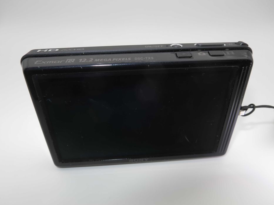Sony Cyber-shot DSC TX9 ултра тънък и компактен фотоапарат, дигитална камера с голям тъч екран, Exmor R в отлично състояние, пълен комплект