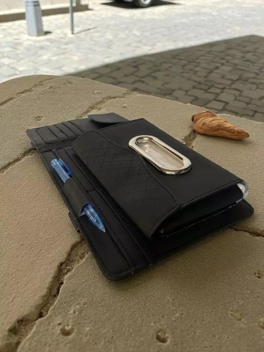 Mashinada quyosh qaetargichida urnatiladigan sumka