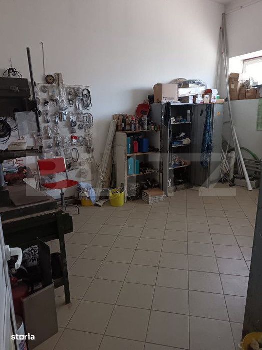 Cladire birouri , hala de productie, spatii depozitare, parcare si ter