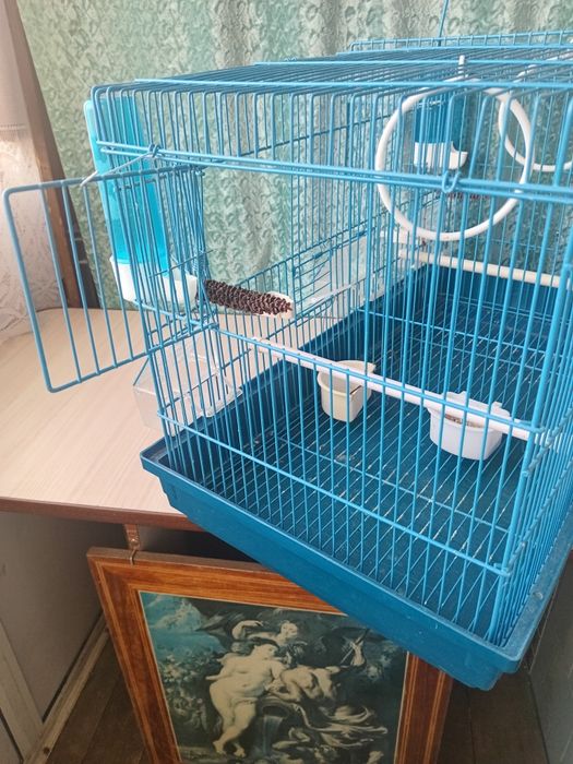 Клетка для декоративных птиц.