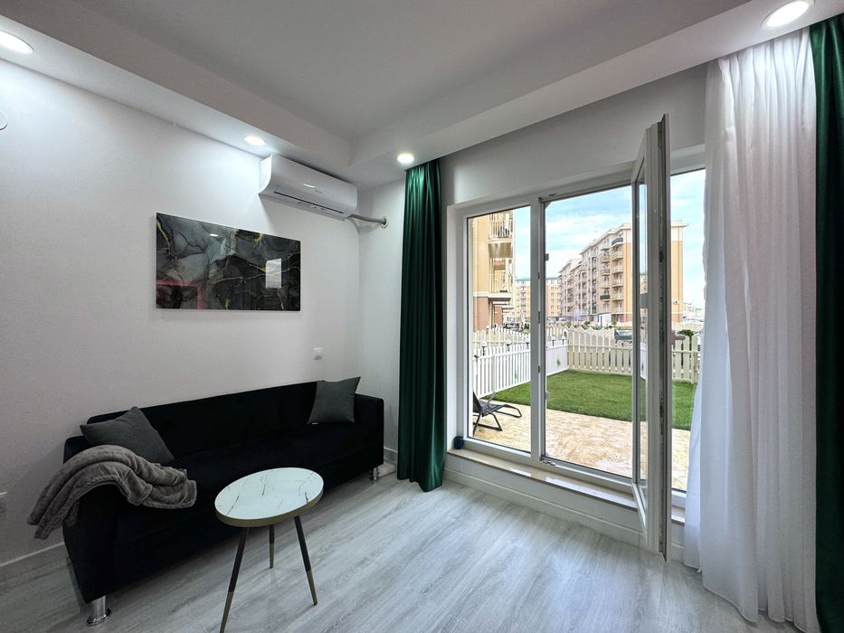 Studio tip garsoniera Cosmopolis parter cu gradina si loc de parcare