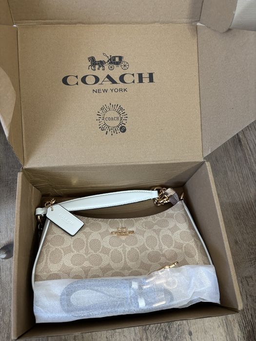 Geantă coach impecabilă