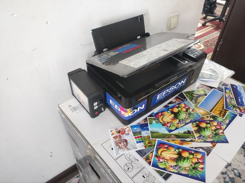 Epson L200 kopy-skanerli rangli idialni ishlidi.Zaprafka poln.Dyuz100%
