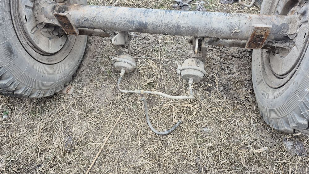 Мост прицепа {Ось}