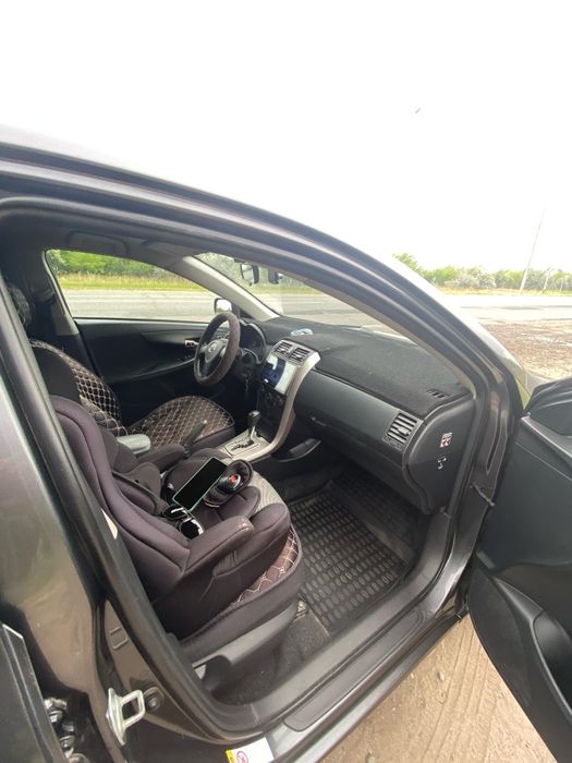 Тойота Каролла 1.6 автомат, европеец