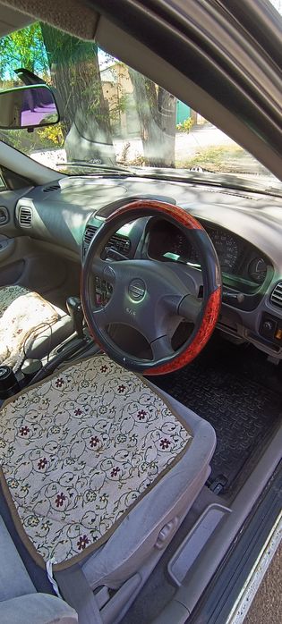 Автомобиль Nissan b15