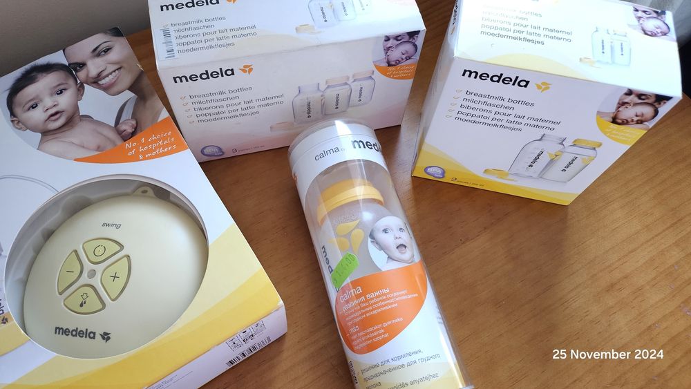 Pompă electrică Medela + biberoane