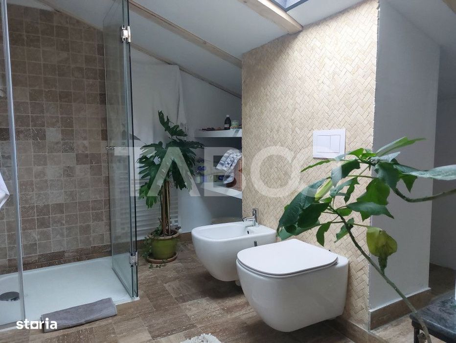 Apartament de vanzare 105 mp 3 camere curte 340 mp in acte Cisnadie