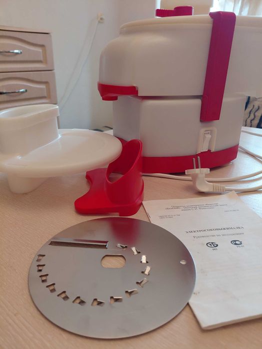 Продам электросоковыжималку/шинковку