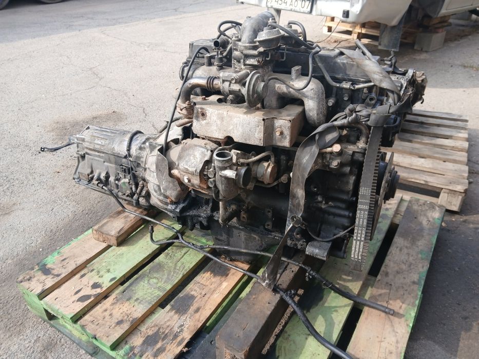 Двигатель 4М40 по запчастям