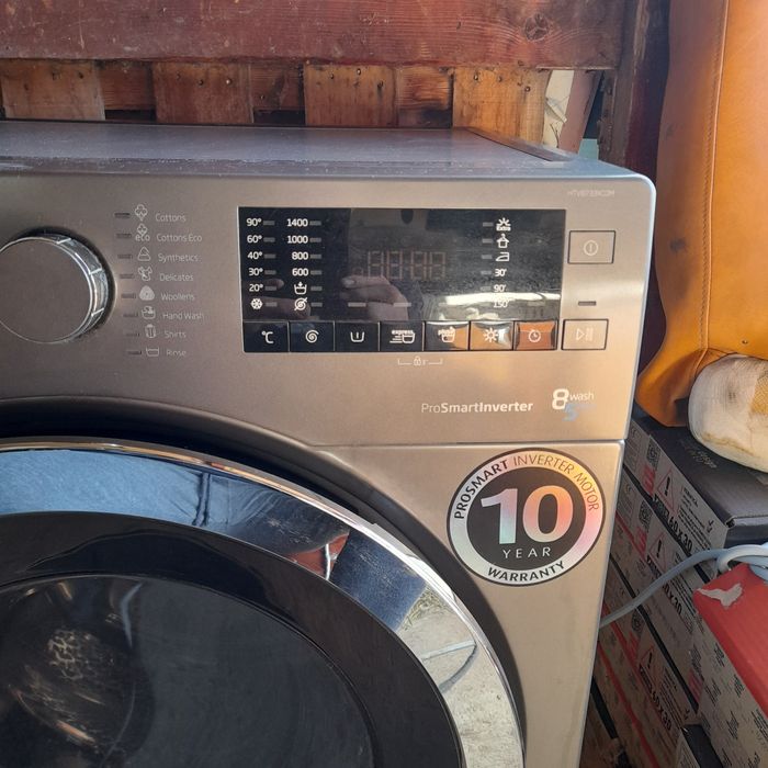 Masina de spalat haine  cu uscator  Beko