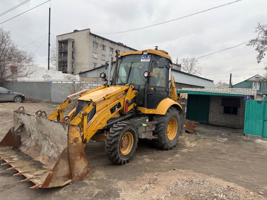 Услуги экскаватора погрузчика