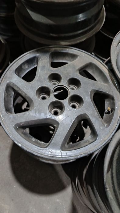 Диск Ниссан оригинал на 15