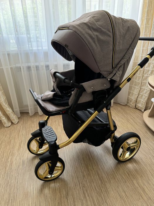 Детская коляска с люлькой и прогулочным блоком