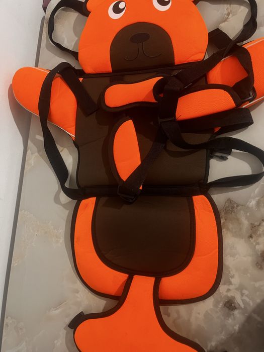 Детский ремень безопасности.