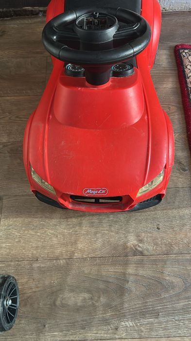 Машинка толокар .