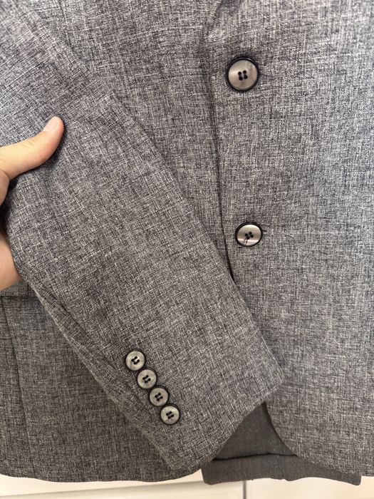 Продам костюм в гранитном сером цвете