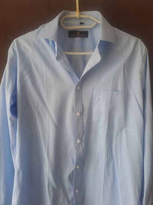 Vînd cămașă modernă;nouă.