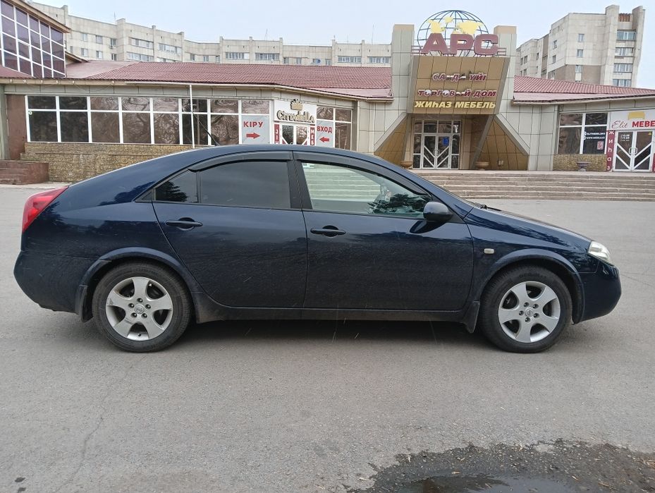 Ниссан Примьера P12