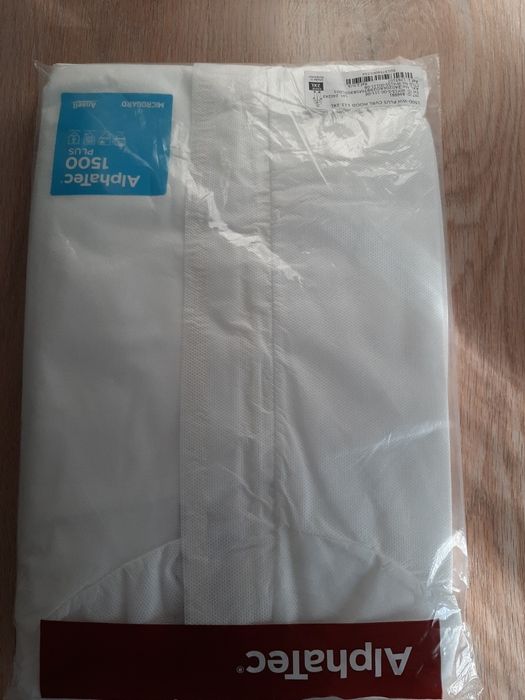 Продам комбинезон одноразовый