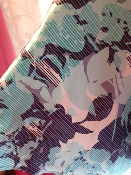 Vând această rochie albastră verzui