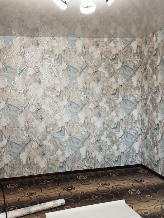 Поклейка  обоев.