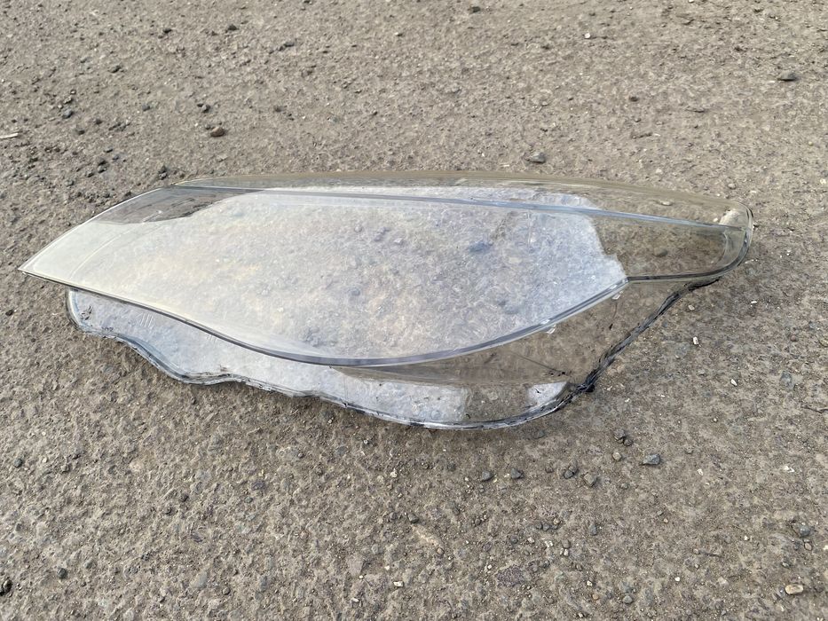 Левое стекло фары BMW E60