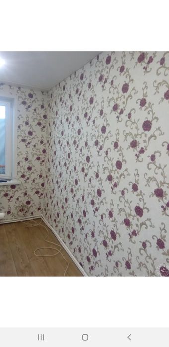 Поклейка обоев .