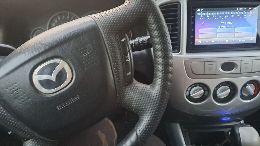 Мазда трибют 2,3